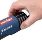 Zadnji del električnih škarij Xpert 2 Heiniger z zaščitno plastiko